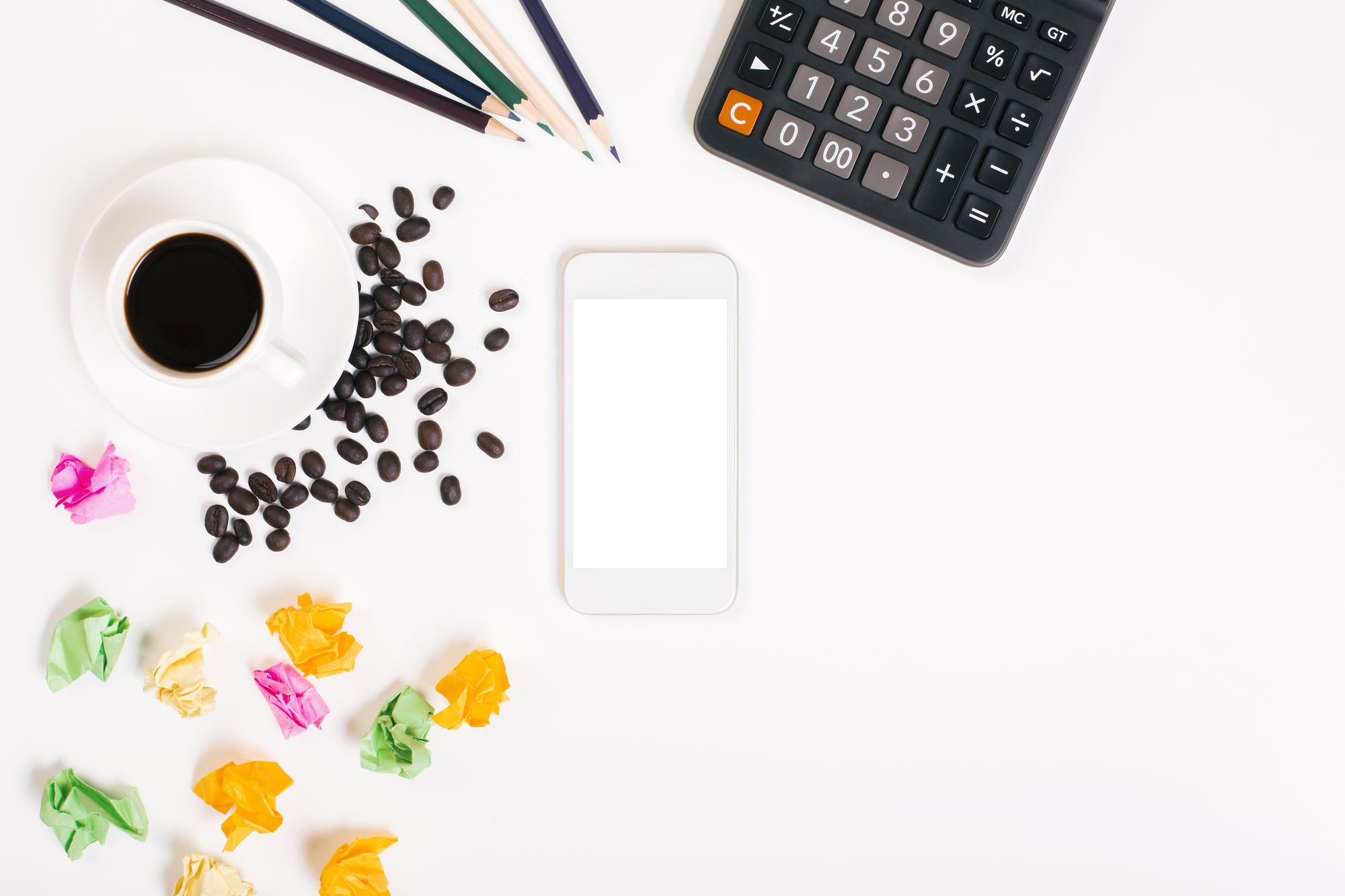 flat lay of budgeting tools and calendar